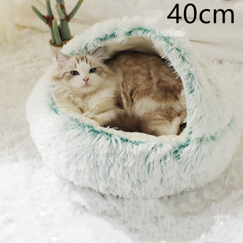 Small dog and kitten snuggled in a round green 40 cm plush Cozy Cat Dog Bed showcasing warmth, comfort, and cozy design with soft material and raised edges