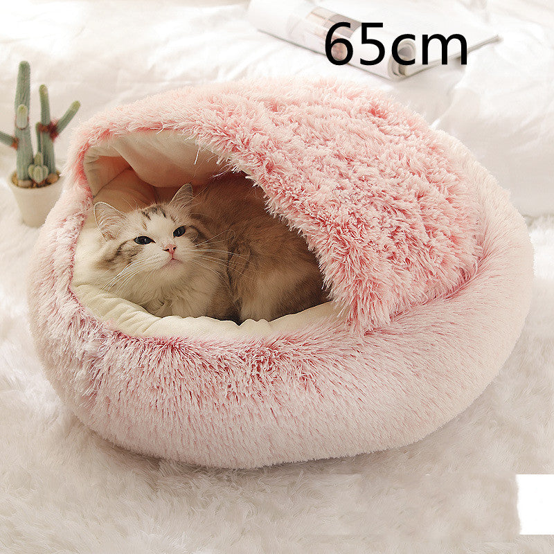 Small dog and kitten snuggled in a round pink 65 cm plush Cozy Cat Dog Bed showcasing warmth, comfort, and cozy design with soft material and raised edges
