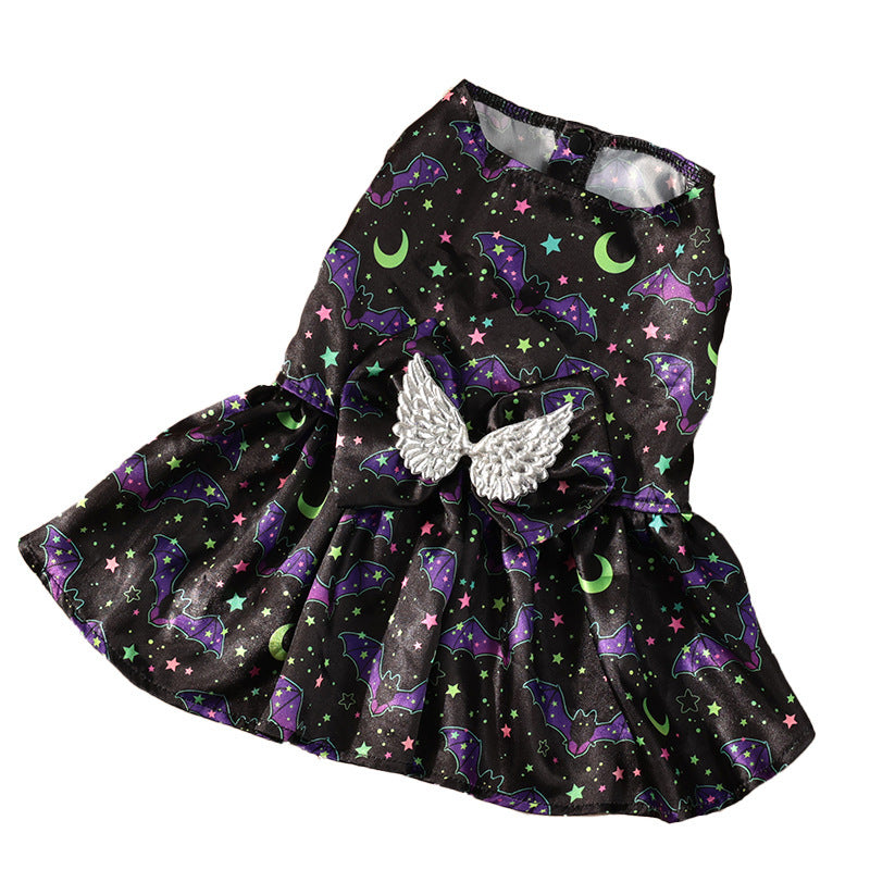 Black dress with purple bats, stars, and green moons on a white background