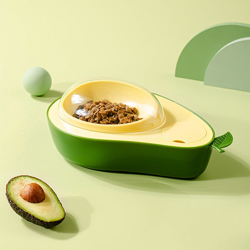 Avocado-shaped Cat Feeder Bowl with a bowl inside on a light green background