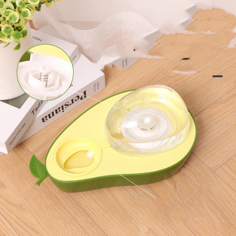 Avocado-shaped Cat Feeder Bowl on a wooden surface with a small inset showing a close-up of the interior.