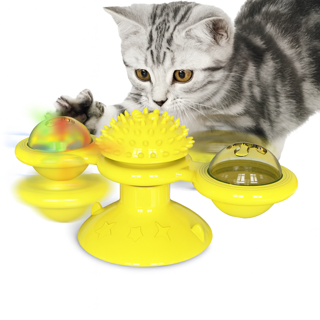 Cat playing with a yellow Cat Rotating Windmill Toy