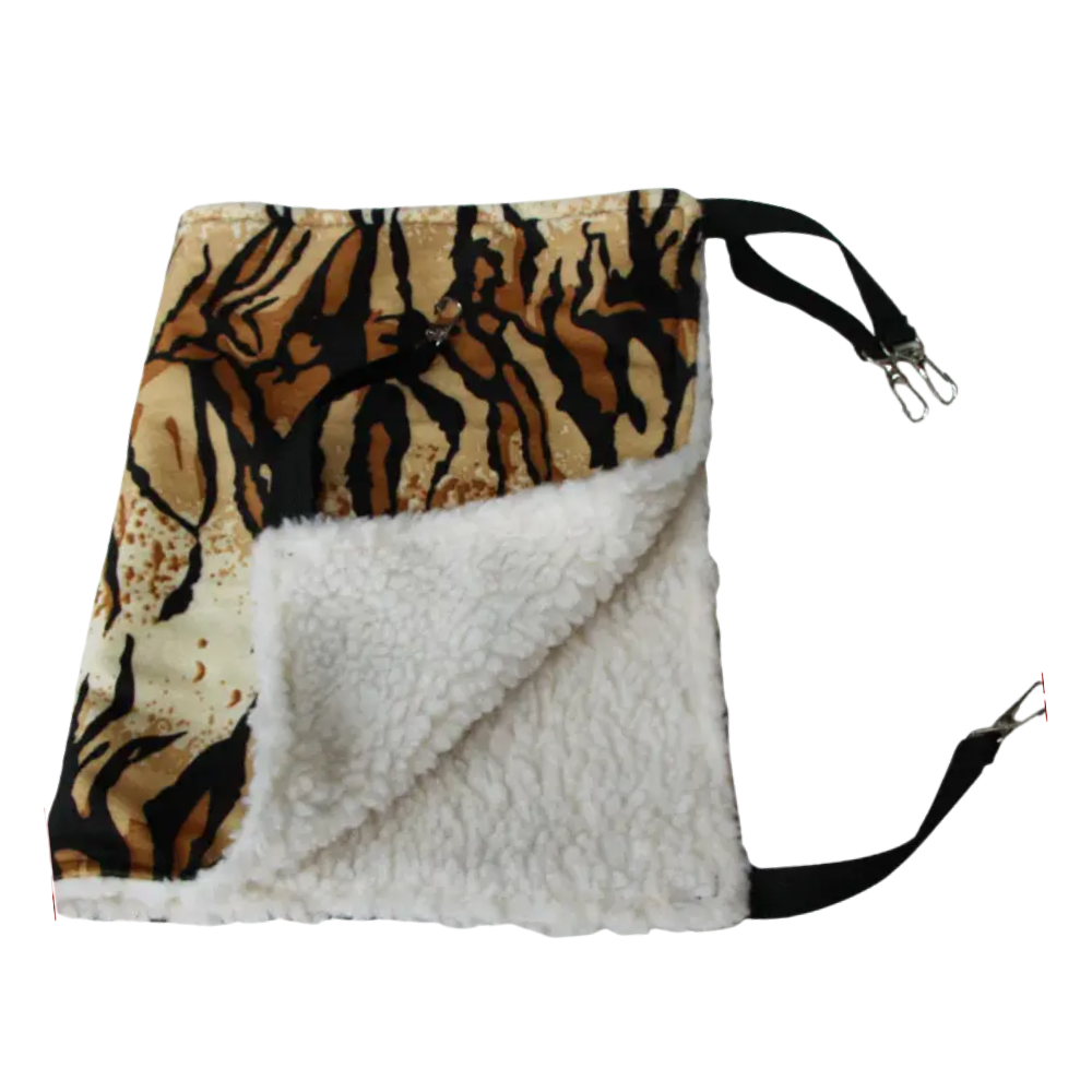 Bag with tiger stripe pattern on one side and white fur on the other, on a white background.