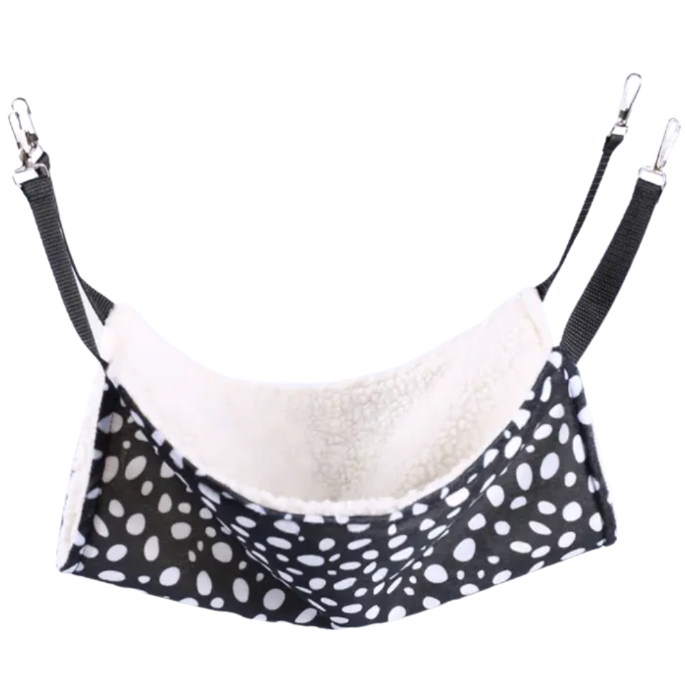 Pet hammock with black and white polka dot pattern on a white background