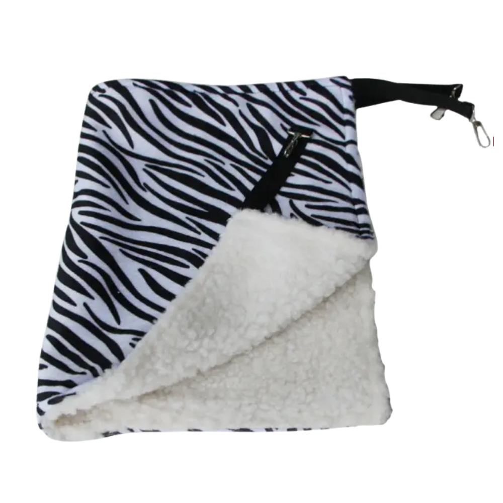 Zebra patterned bag with white interior on a white background