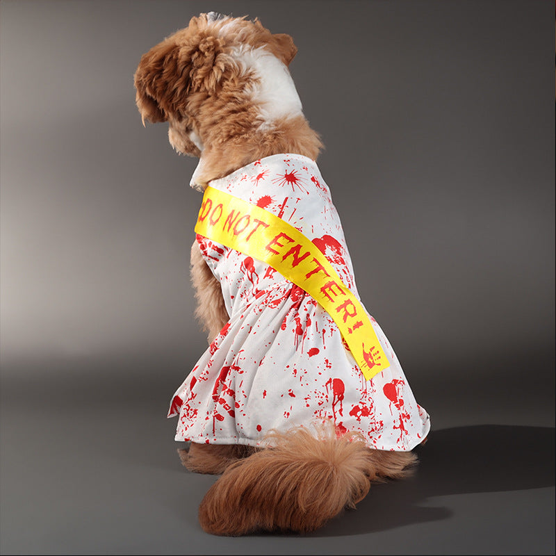 Dog wearing a Halloween costume with 'Do Not Enter' sign and bloodstains on a gray background