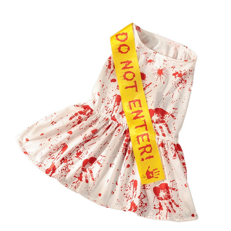 Dress with red splatter pattern and yellow 'DO NOT ENTER!' sash on a white background