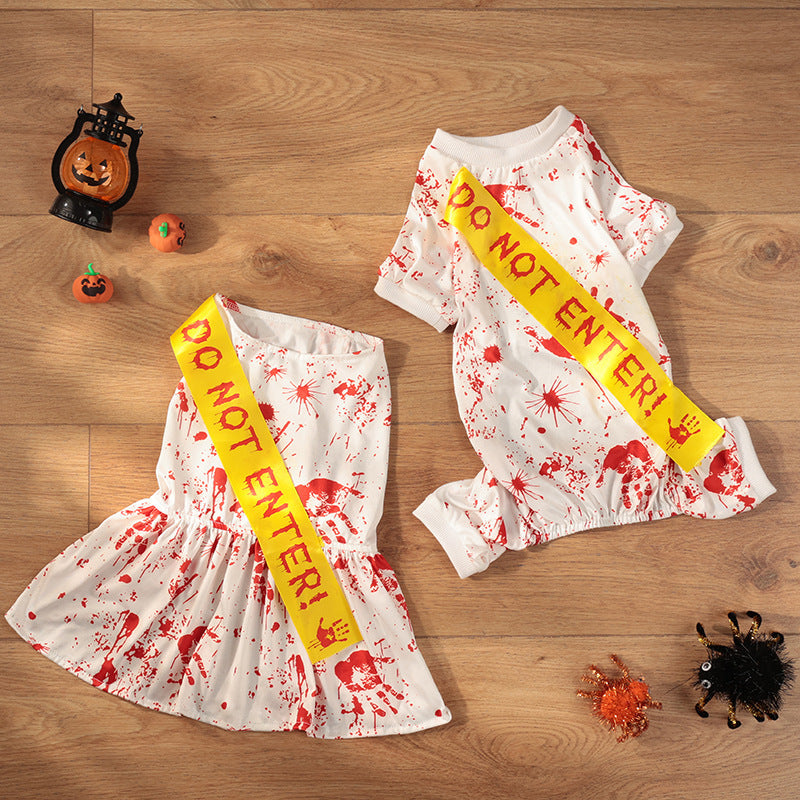 Halloween-themed sashes with 'DO NOT ENTER!' text on a wooden surface with Halloween decorations.