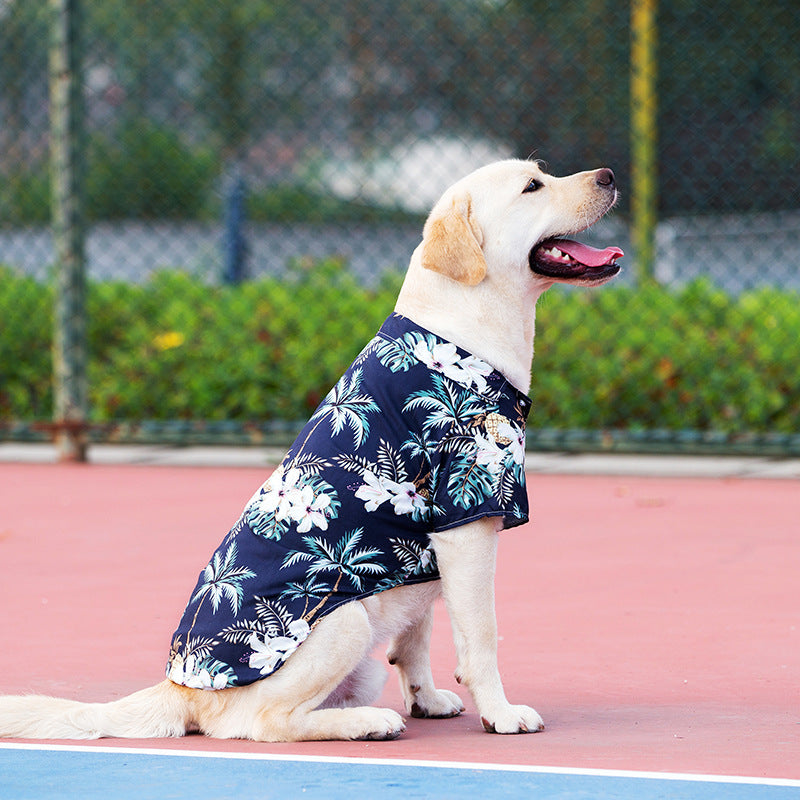 Navy blue Hawaiian Pet Shirt for Dogs and Cats featuring tropical patterns. Ideal for summer fun and a comfy fit for your pet dog with perfil view