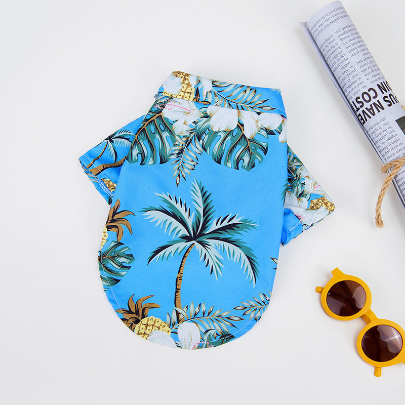 Sky blue Hawaiian Pet Shirt for Dogs and Cats with pineapple print for dogs and cats, perfect for summer adventures, offering comfort and a fun tropical look.