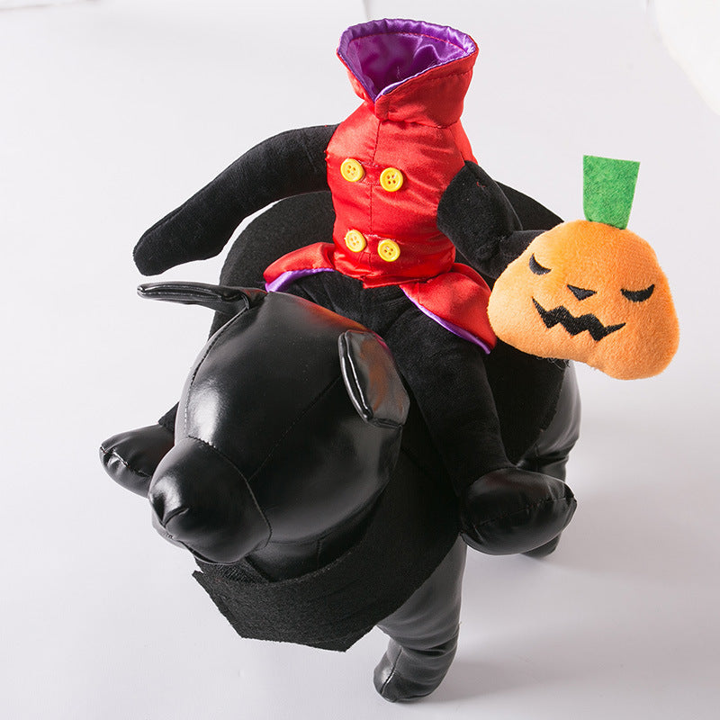 Black dog plush toy wearing a Halloween costume with a red jacket and pumpkin accessory on a white background