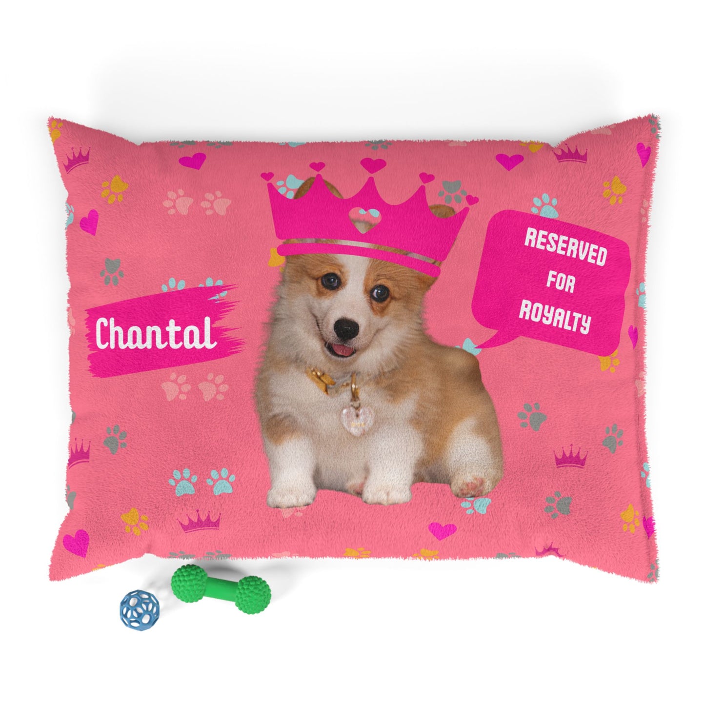 Pink pillow with a dog design and text on a white background