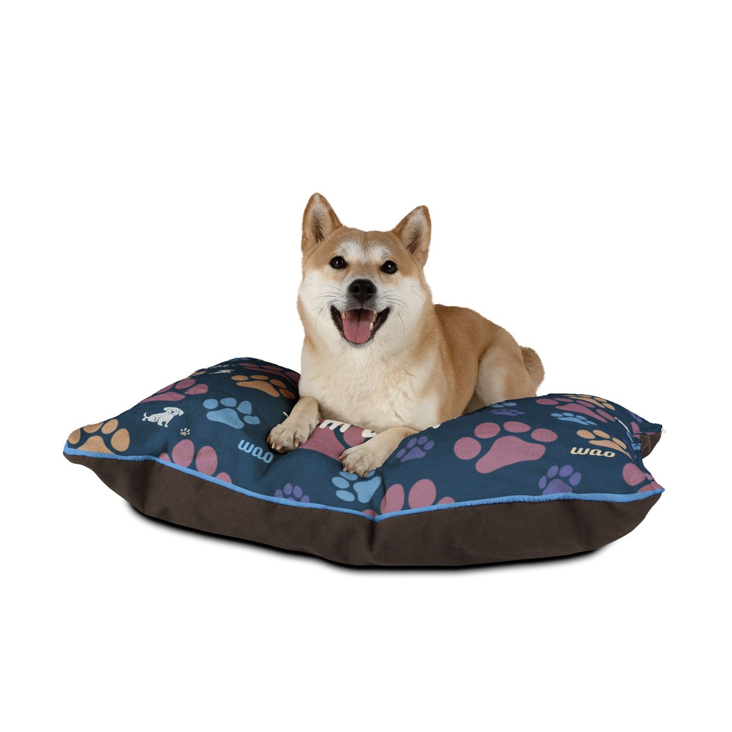 Dog sitting on a colorful paw-patterned pet bed with a white background