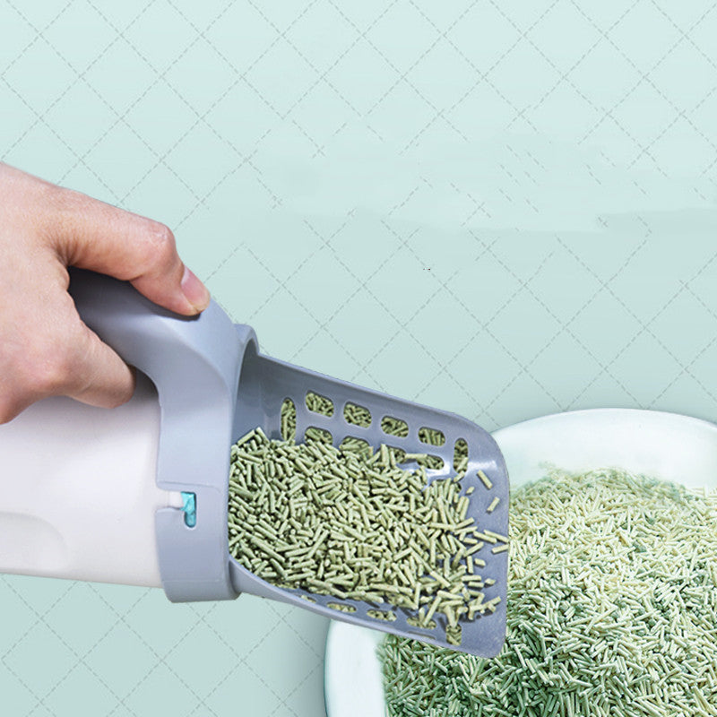 Cat Litter Scooper with Storage Box and a cat next to it see in action