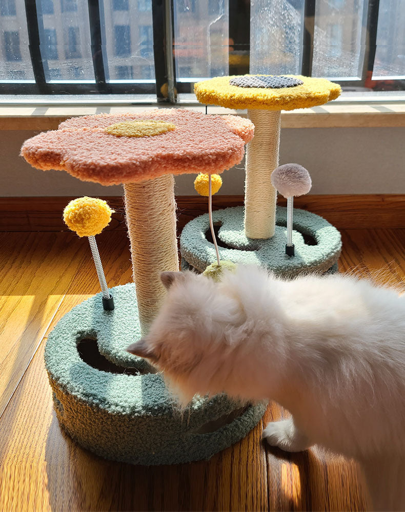 Colorful cat scratcher and climbing toy for claw grinding. Durable sisal, soft fur, and multi-functional design in yellow and pink. Perfect for playful cats cover image