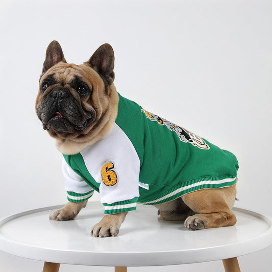 Dog wearing a green Pet Baseball Shirt for Dogs and Cats made of soft cotton, perfect for keeping pets warm and stylish during cooler weather.