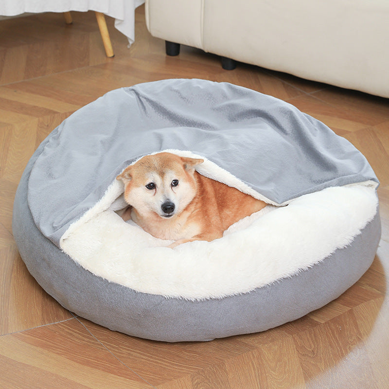 Small dog peacefully sleeping in orthopedic dog bed, warm and cozy winter pet bed, waterproof and stain resistant gray