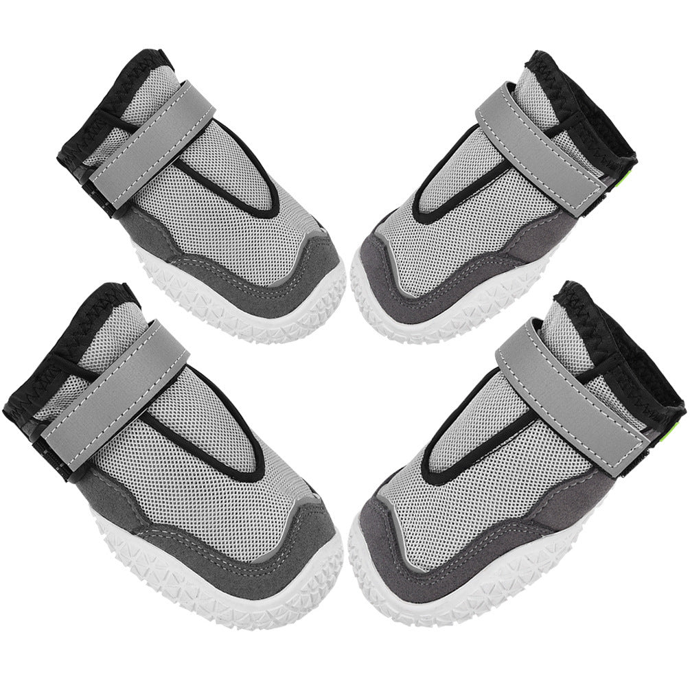 Breathable and wear-resistant grey dog shoes protecting paws in outdoor conditions