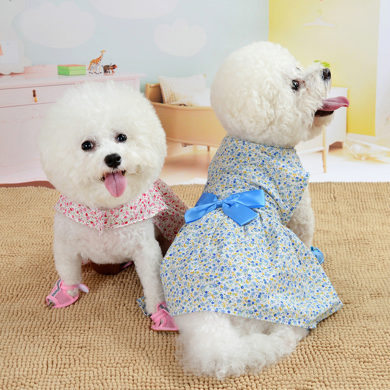 Two dogs wearing princess dresses, one in red and one in blue, featuring floral patterns and bowknots. Perfect for special occasions and everyday elegance.