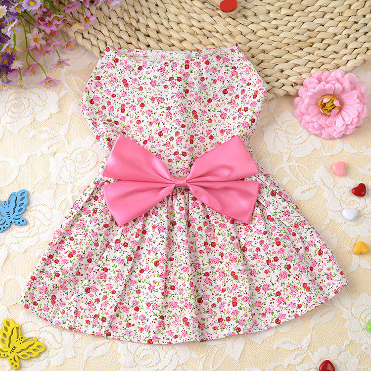 Red floral princess dog dress with a bowknot, made of breathable cotton. Perfect for stylish and comfortable pet fashion