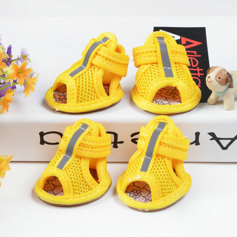 Yellow small dog shoes with a high-top design, waterproof material, and anti-slip sole for added comfort and paw protection