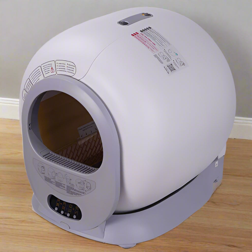 Smart self-cleaning litter box with automatic scooping, odor control, and app connectivity for cats rear view