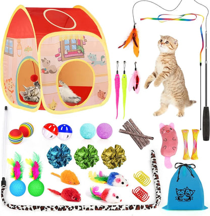 Collection of cat toys including a playhouse, toys on strings, and various other cat toys on a white background.