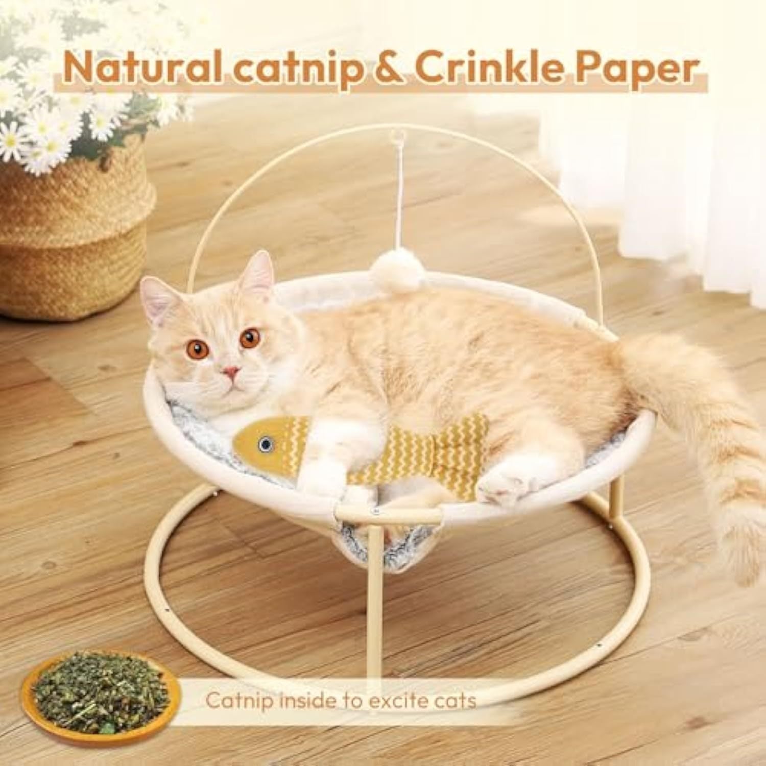 Cat lying on a hammock with crinkle paper and catnip, on a wooden floor.