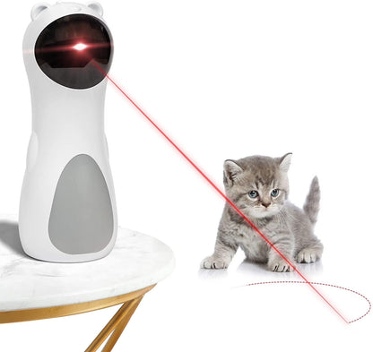 White electronic device with red laser beam and a kitten on a white background