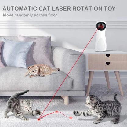 Automatic cat laser rotation toy with cats playing around it in a living room setting.