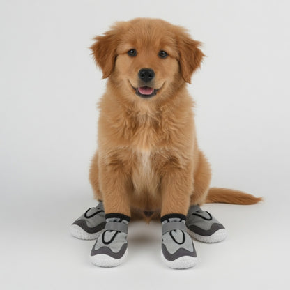 Dog wearing gray and white dog boots on a white background