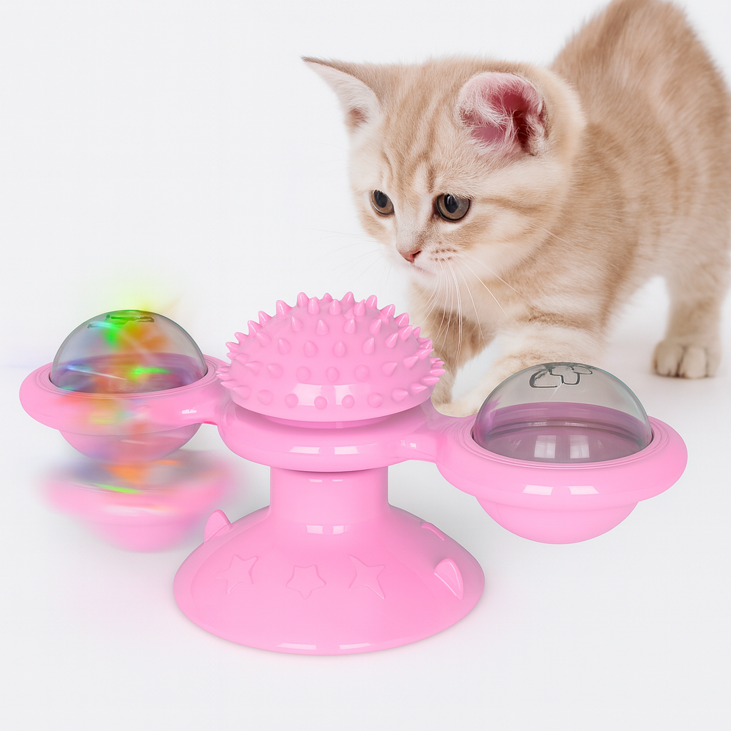 Cat playing with a pink Cat Rotating Windmill Toy with colorful ball inside