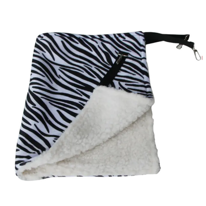 Zebra patterned bag with white interior on a white background