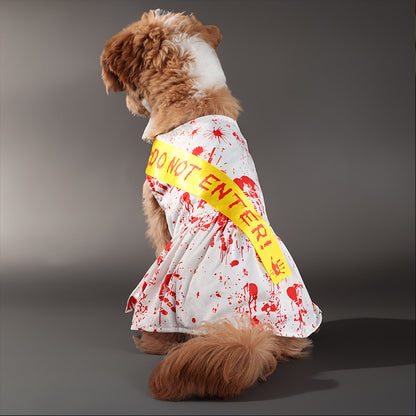 Dog wearing a Halloween costume with 'Do Not Enter' sign and bloodstains on a gray background