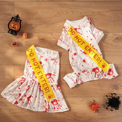 Halloween-themed sashes with 'DO NOT ENTER!' text on a wooden surface with Halloween decorations.