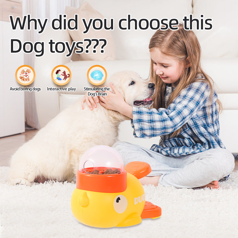 Girl playing with a dog and a yellow and orange dog toy on a carpeted floor.