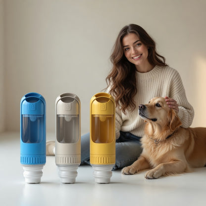 Woman with a dog sitting next to three colorful pet water bottles on a light surface.