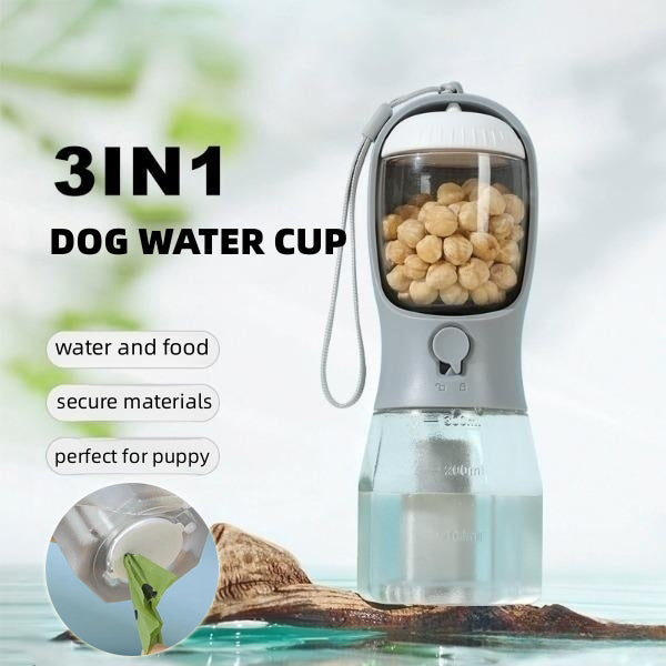 Dog Water Bottle — Filter, Food & Bags 3-in-1 dog water cup with food compartment on a blurred natural background