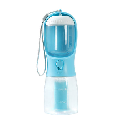 Blue and clear portable pet water bottle with a strap on a white background