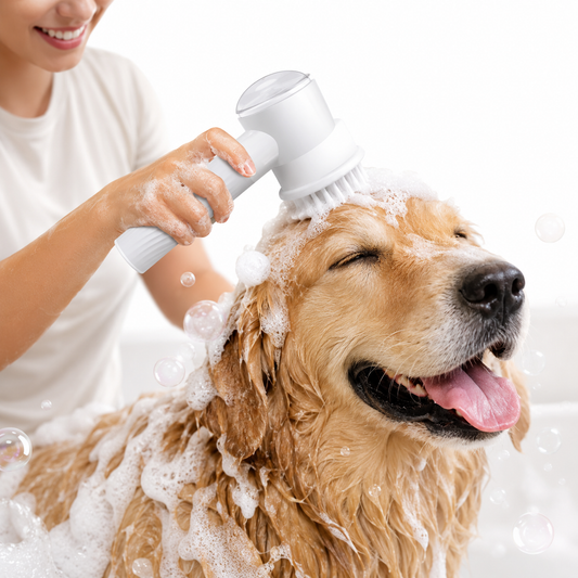 Dog being bathed with an Electric Pet Bathing Brush by a person.