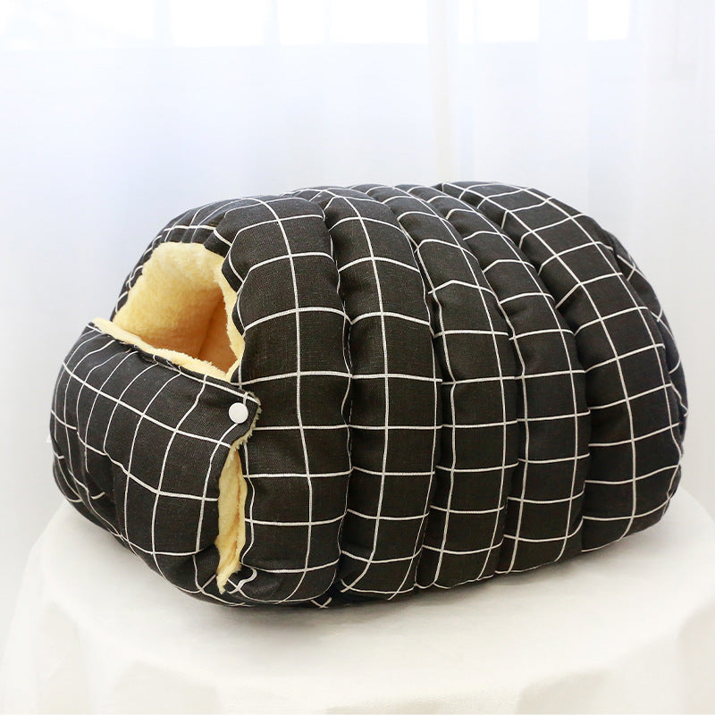 Black and white Enclosed Pet Bed with beige interior on a white background
