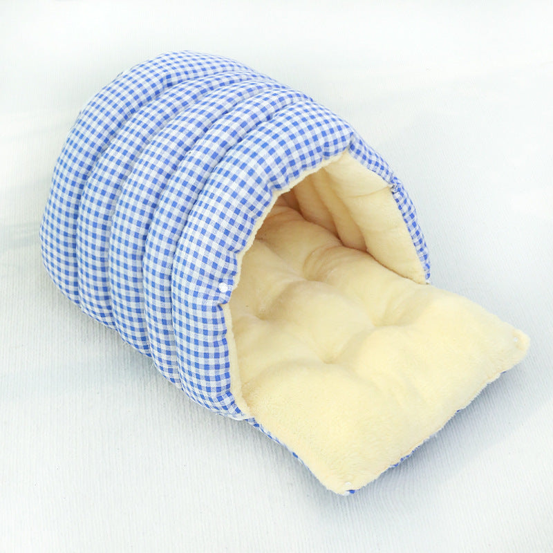 Blue and white Enclosed Pet Bed with beige interior on a light gray background