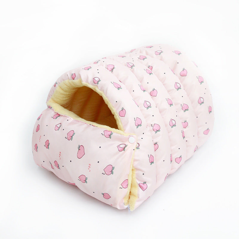 Pink Enclosed Pet Bed with peach pattern on a white background
