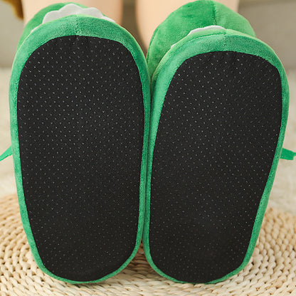 Green Funny Plush Slippers for Pet Owners with black soles on a woven surface