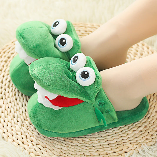 Green Funny Plush Slippers for Pet Owners with googly eyes on a woven mat