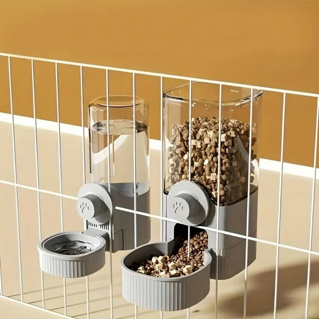 Gravity Pet Feeder Hanging Bowl with clear container and gray base on a yellow background