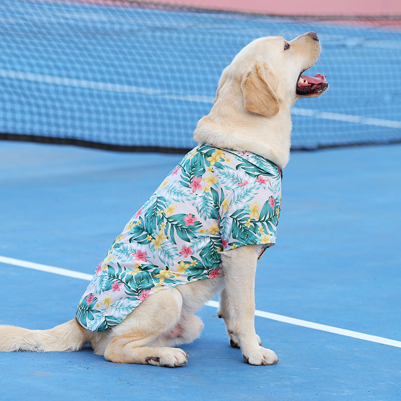 Pomegranate blossom Hawaiian pet shirt for dogs and cats, with a vibrant tropical design, perfect for summer and keeping your pet stylish and comfortable perfil view.