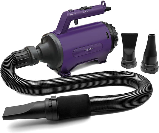 Purple handheld vacuum cleaner with attachments on a white background