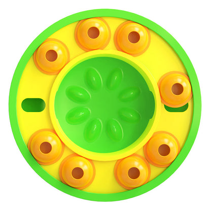 Circular Interactive Pet Puzzle Slow Feeder with yellow center and orange rings on a white background