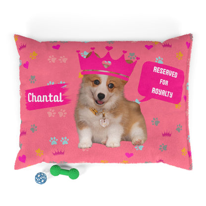 Pink pillow with a dog design and text on a white background